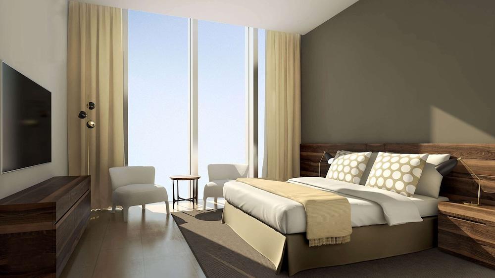 الشقق الفندقية ألِف الدوحة ريزيدنسز مجموعة كوريو من هيلتون المظهر الخارجي الصورة A bedroom