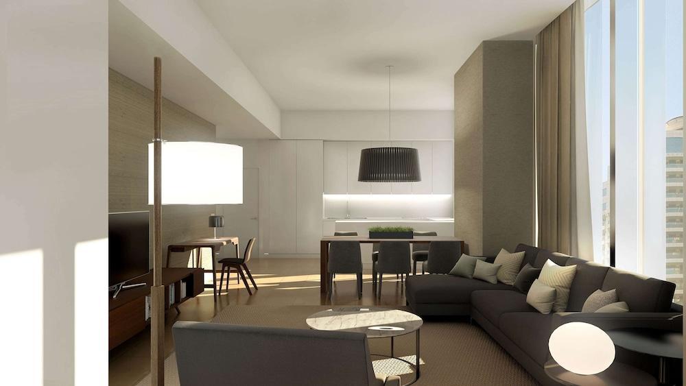 الشقق الفندقية ألِف الدوحة ريزيدنسز مجموعة كوريو من هيلتون المظهر الخارجي الصورة Interior of a typical apartment