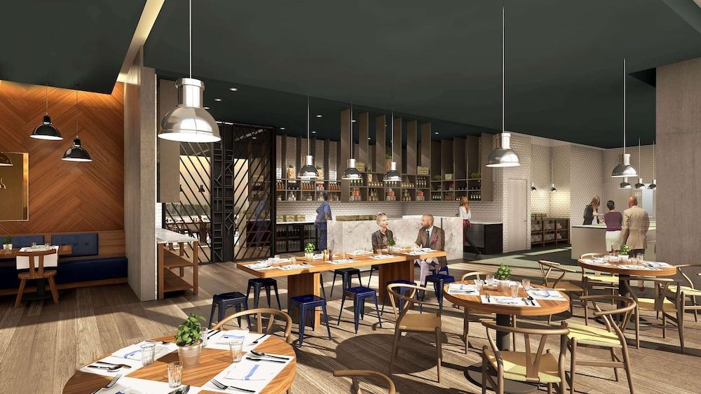 الشقق الفندقية ألِف الدوحة ريزيدنسز مجموعة كوريو من هيلتون المظهر الخارجي الصورة The interior of the restaurant