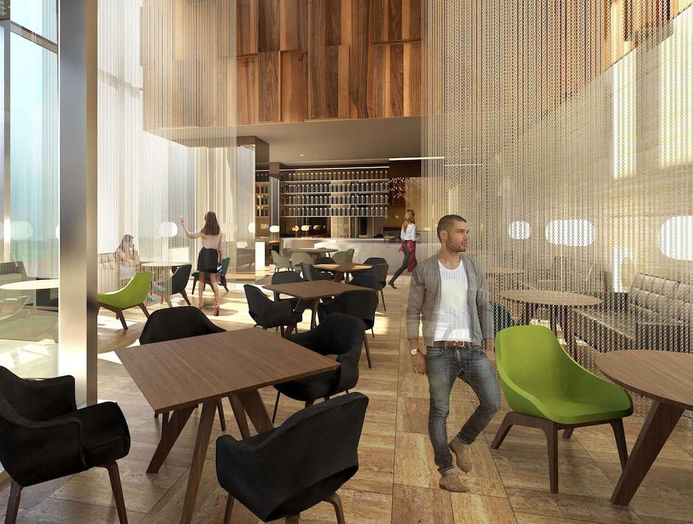 الشقق الفندقية ألِف الدوحة ريزيدنسز مجموعة كوريو من هيلتون المظهر الخارجي الصورة The interior of the new restaurant