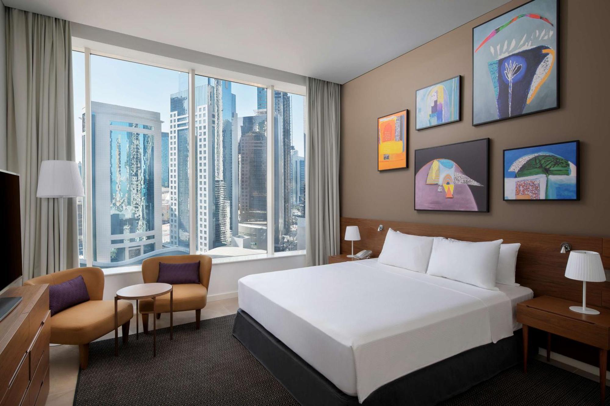 الشقق الفندقية ألِف الدوحة ريزيدنسز مجموعة كوريو من هيلتون المظهر الخارجي الصورة A guest room at the hotel