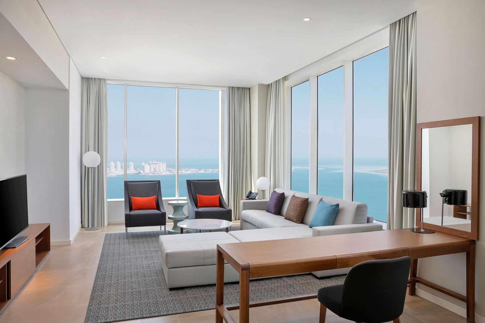 الشقق الفندقية ألِف الدوحة ريزيدنسز مجموعة كوريو من هيلتون المظهر الخارجي الصورة A suite at the hotel
