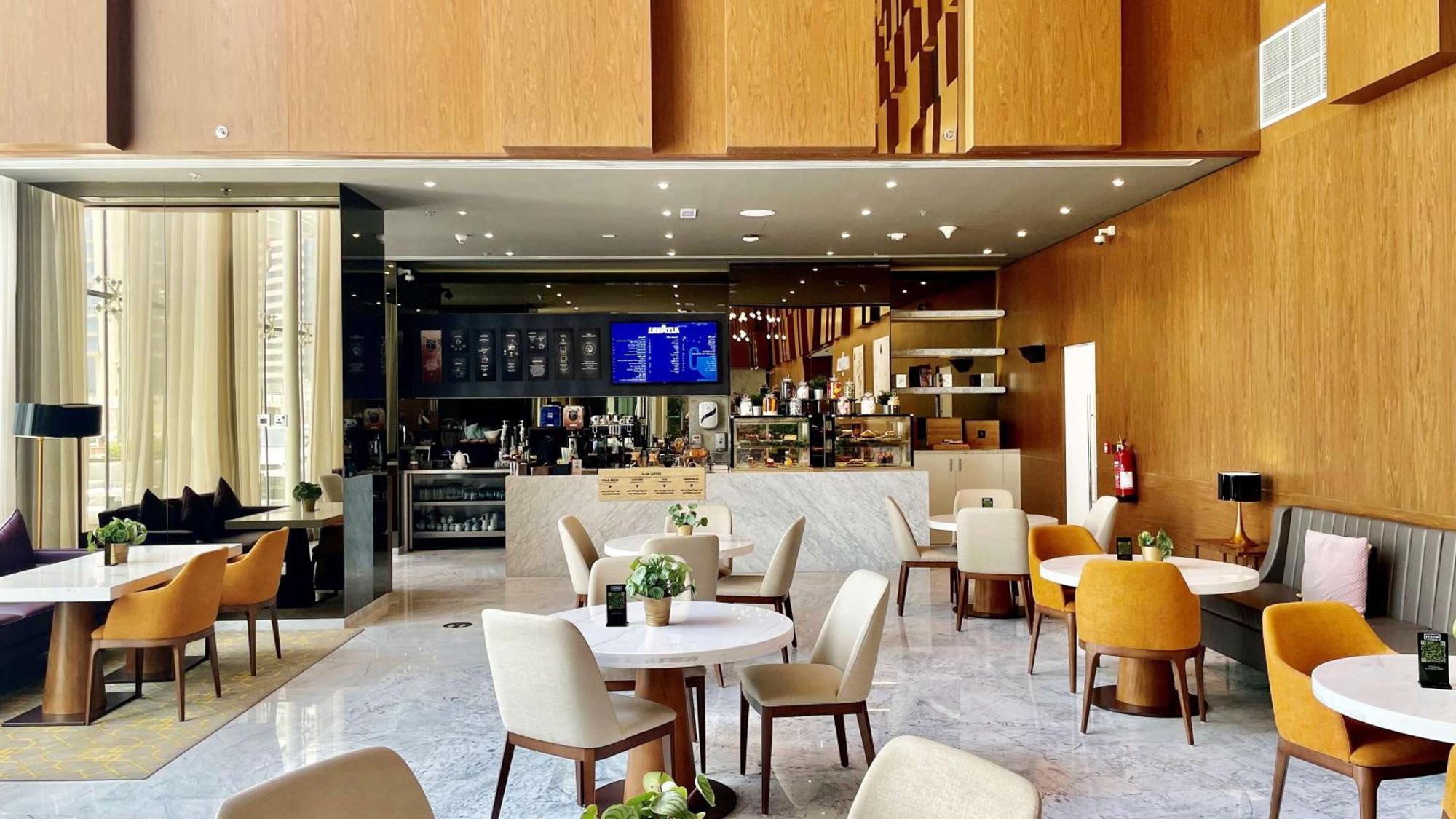 الشقق الفندقية ألِف الدوحة ريزيدنسز مجموعة كوريو من هيلتون المظهر الخارجي الصورة The lounge at the airport