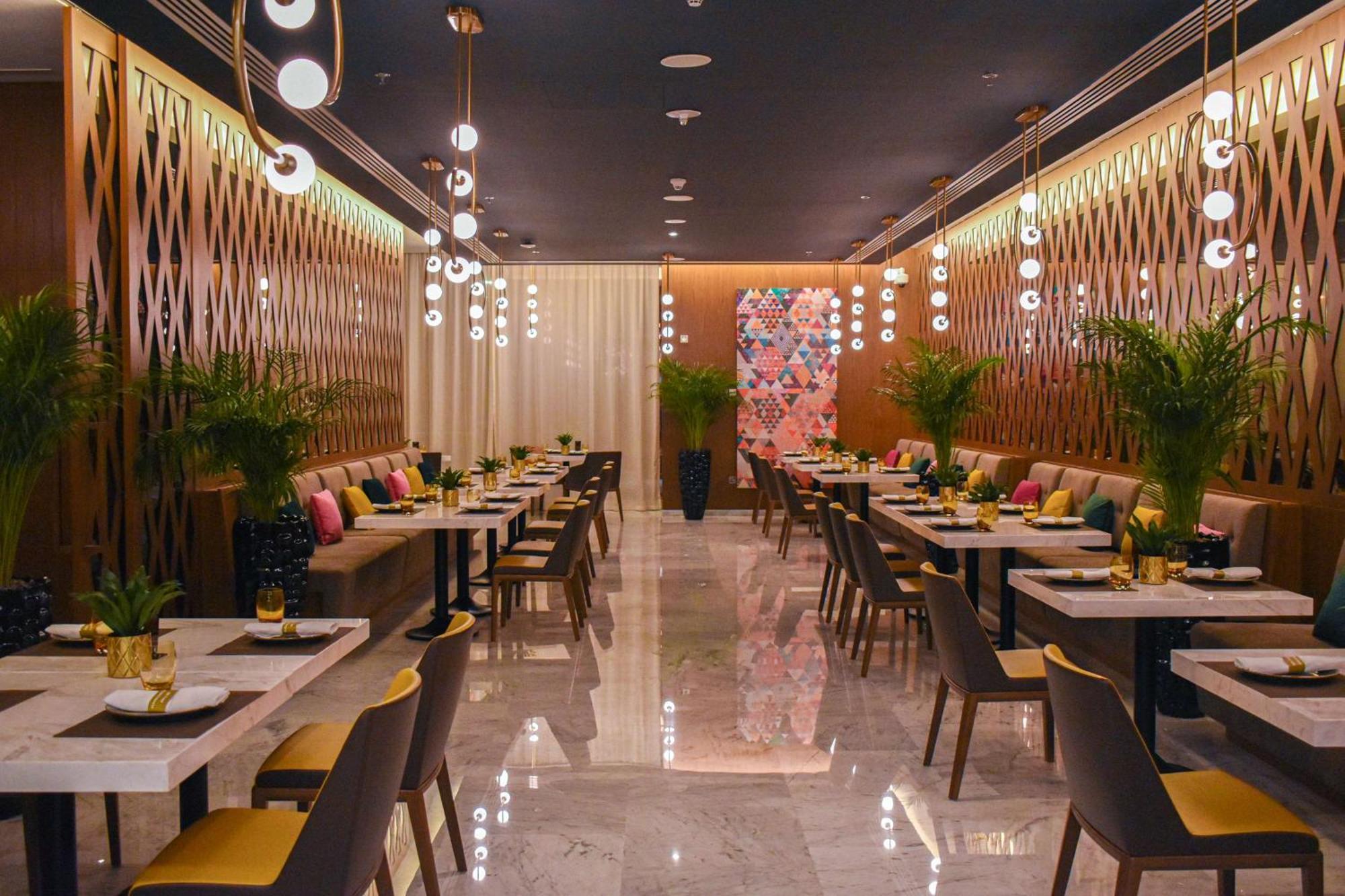 الشقق الفندقية ألِف الدوحة ريزيدنسز مجموعة كوريو من هيلتون المظهر الخارجي الصورة Restaurant interior